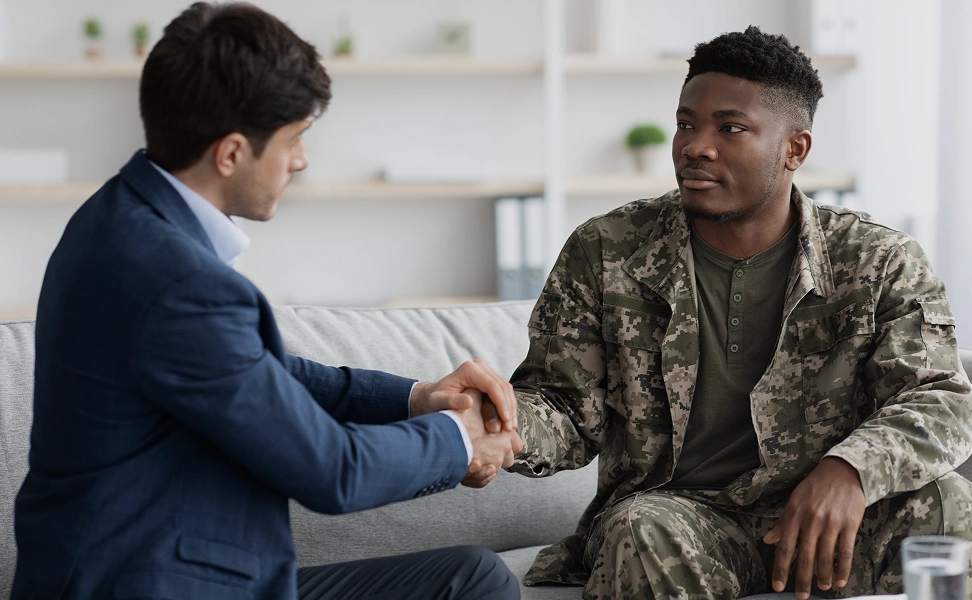 happy black military man shaking hand